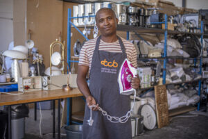 Siyabulela Velele TCB Repair entrepreneur fixing and selling appliances in Nyanga East