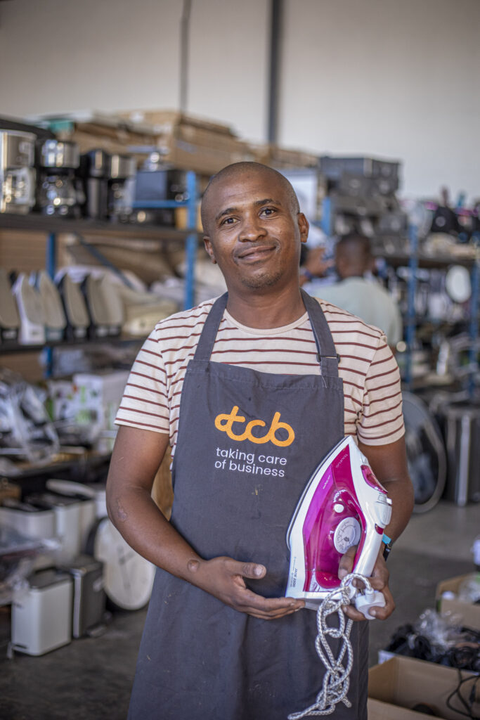 Siyabulela Velele TCB Repair entrepreneur fixing and selling appliances in Nyanga East